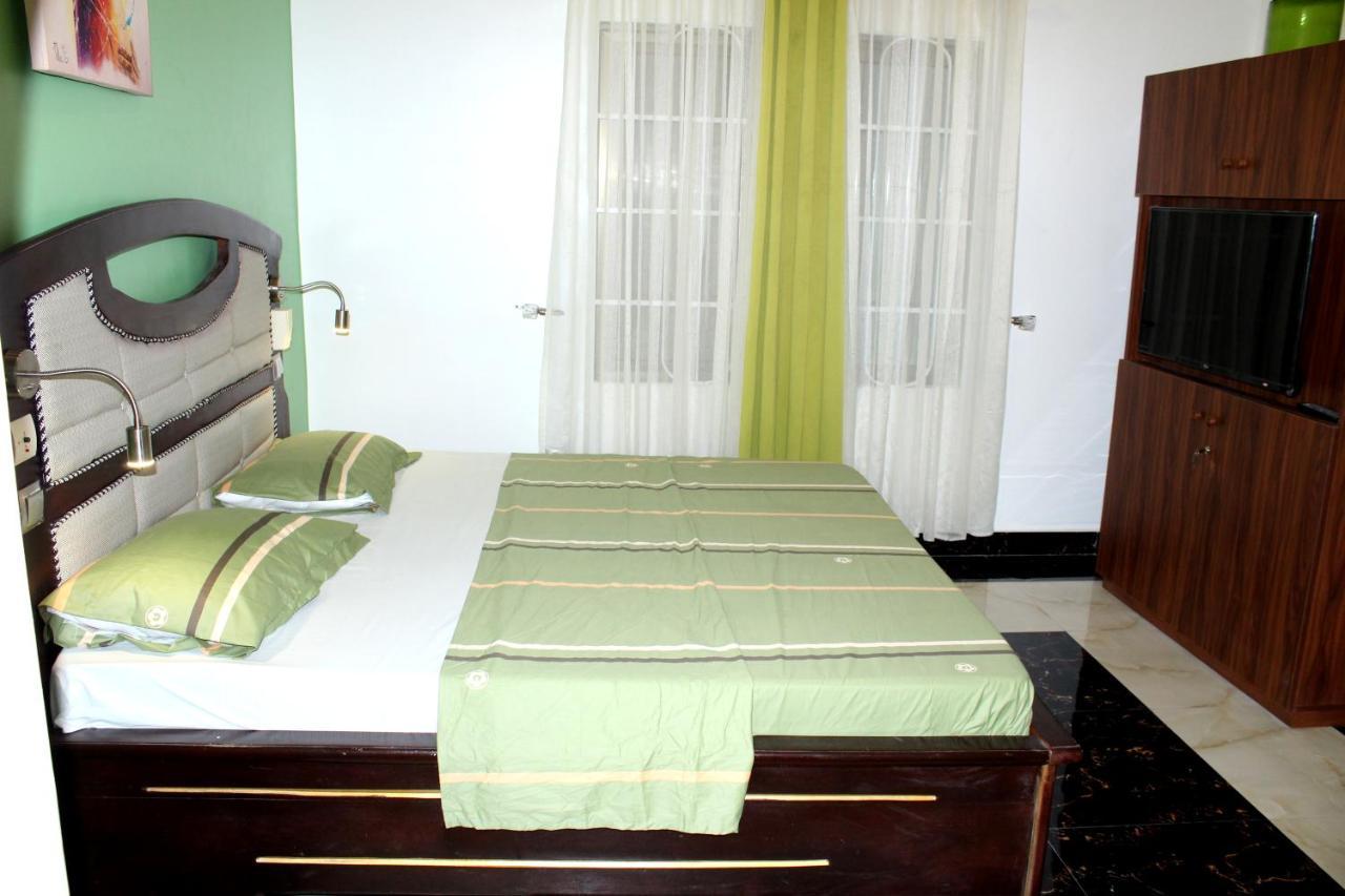 Residence Palais Du Stade Cotonou Esterno foto
